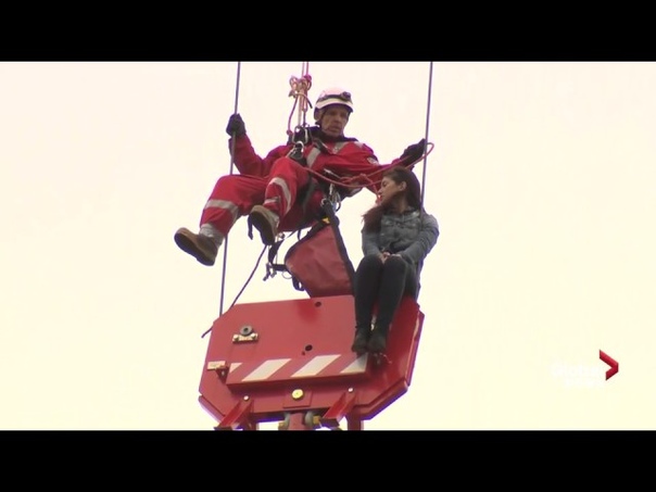 Woman rescued from crane in Toronto arrested for