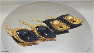 Black and gold leaf drop earrings, twisted peyote