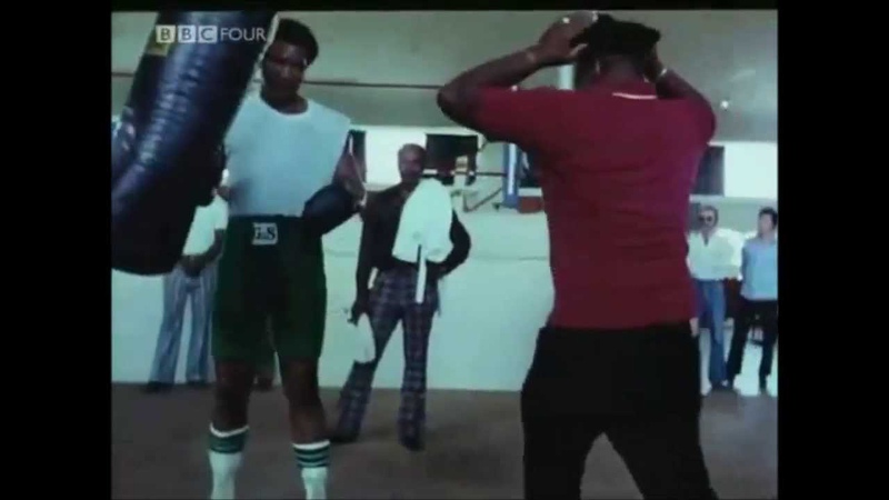 George Foreman Hitting Heavy Bag