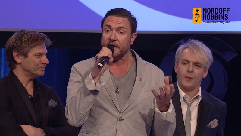 Duran Duran collect their Lifetime Achievement Award at the O2 Silver Clef Awards