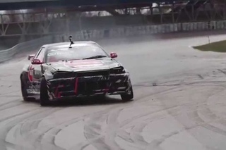 Look at  Bartosz Ostałowski  , one drift man in the world, who drive with feet !