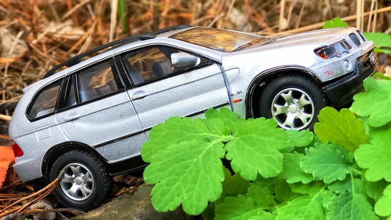 BMW Toy Car Driving on the Wood in the Cars