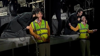 Matty Healy shares a kiss with the security guard while performing at The 1975 concert