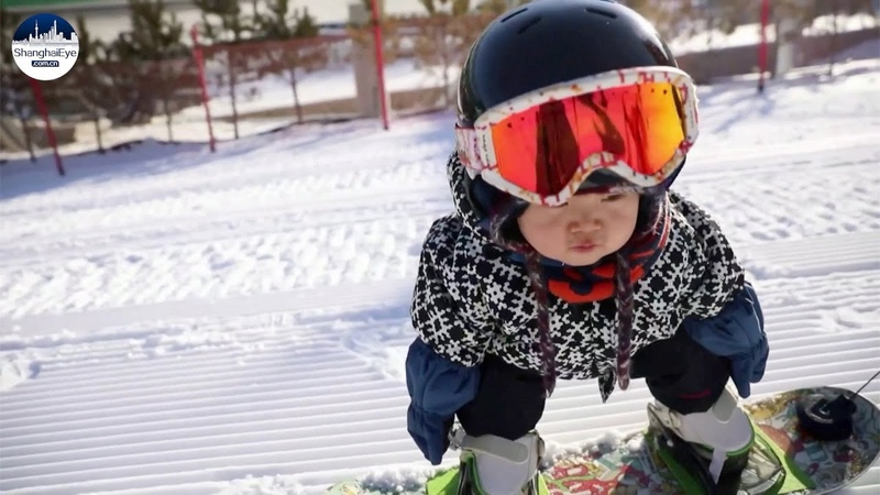 CUTE 11 month old Chinese snowboarder melting